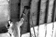 Application of Spray Foam Insulation on an interior wall.